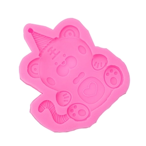 Pink silicone cartoon tiger mold with hat for cake decorating and chocolate crafting