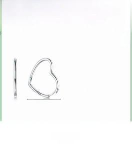 Detail view of heart-shaped s925 silver hoop earrings with LOVE engraving and 2.7cm size