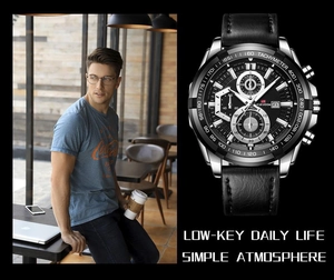 Close-up of a men's chronograph watch with black leather strap in a casual lifestyle scene