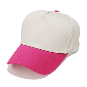 Detail shot of the two-tone canvas cap with rose red brim and white panels