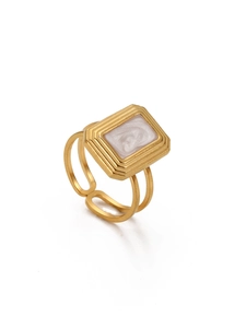 Detailed close-up of double-band adjustable gold ring with light purple enamel inlay