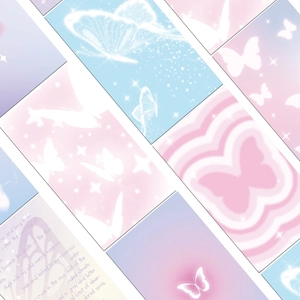 Detailed close-up of decorative butterfly phone stickers in pastel pink and blue tones