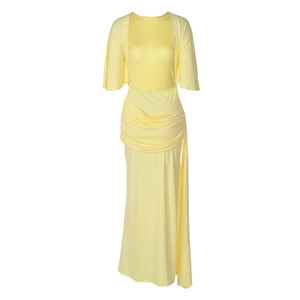 Detail of the yellow dress featuring elegant waist pleats and flowing fabric texture