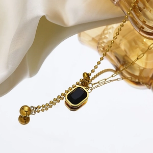 Retro gold plated necklace with rectangular black gemstone and mixed chain links