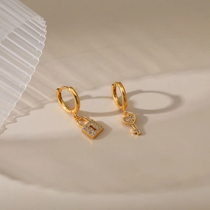 Asymmetric 18K gold-plated heart key and lock dangle earrings with zircon accents