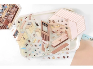 Macro detail of PAPERMORE coffee-themed transparent 3D stickers for DIY creative decoration