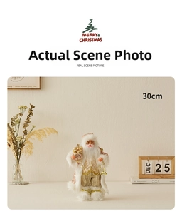 Detail of 30cm rose gold Santa Claus figure holding a gift bag in a festive setting
