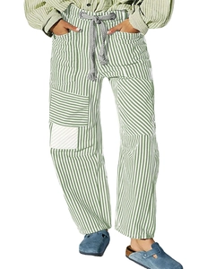 Detail of green and white striped casual pants with drawstring waist and cargo pockets