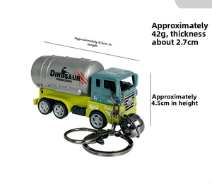 Detailed view of dinosaur fuel tank truck keychain with bells and dimensions 8.6cm by 4.5cm