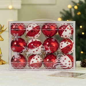 Close-up of red and white glitter Christmas balls in a gift box for holiday decor