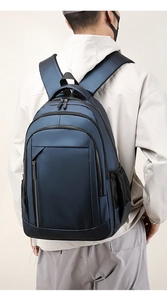 Deep blue large capacity backpack with multiple zipper pockets and side mesh water bottle holder