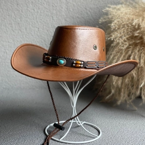 Classic brown leather-textured western cowboy hat with turquoise bead band decoration