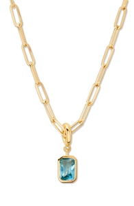 Detail of 18K gold plated chain with emerald cut light blue gemstone teardrop pendant