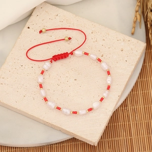 Handmade woven seed bead bracelet with white baroque pearls and red cord for women