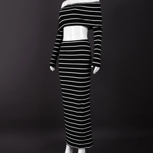 Detailed view of the black and white striped ribbed knit texture on long sleeve crop top set