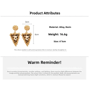 Detailed view of leopard print resin triangle earrings with hammered gold metal studs