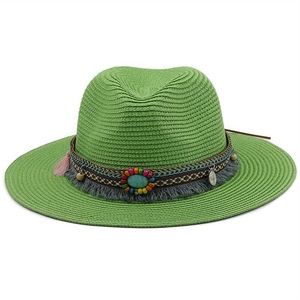 Detail of lime green straw fedora with bohemian turquoise bead band and tassels