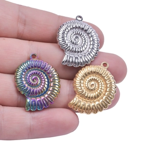 Three metallic nautilus shell pendants in gold, silver, and rainbow colors for DIY jewelry