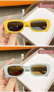Gros plan sur des lunettes de soleil rectangulaires rétro en jaune et vert clair