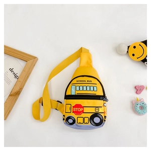 Detail view of the yellow school bus chest bag for kids with adjustable shoulder strap