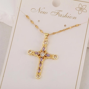 Golden cross pendant necklace with purple marquise zircons and white crystals on chain