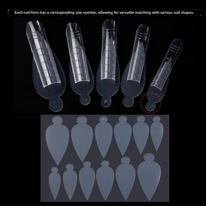 Detailed view of French nail tips and molds numbered 0 to 11 for professional manicure extension