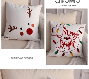 Detailed view of Christmas pillow covers with Merry and Bright embroidery on a soft sofa