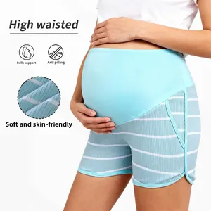 Detailed view of light blue striped maternity shorts with high waist belly support panel