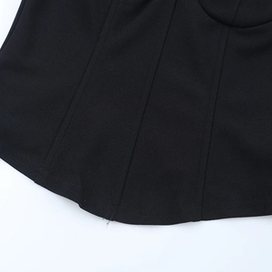 Close-up of the black lace hem and fine stitching details on this sexy camisole top