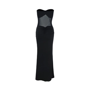 Detailed back view of sexy black tube maxi dress with sheer mesh panel and ruching details