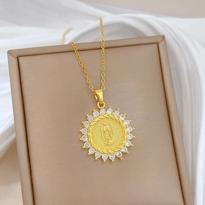 Elegant gold titanium steel necklace with crystal-encrusted portrait pendant on silk