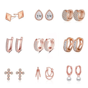 Collection of 925 sterling silver earrings in rose gold with zircon and pearl details