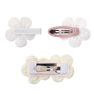 Floral embroidery and crochet hair clips set for girls featuring daisy and camellia designs