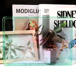 Detailed view of rectangular light green glitter resin tray for jewelry storage
