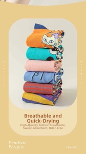 Detail of breathable cotton crew socks with vibrant colorful cartoon cat patterns