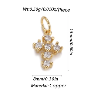 Detail of gold plated copper cross pendant with zircon inlay and product measurements