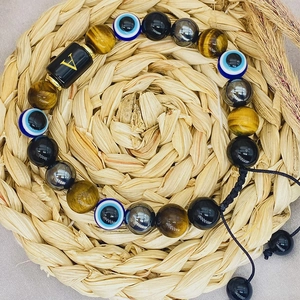 10mm Tiger Eye stone bracelet with Evil Eye charm and letter V on hand-woven adjustable cord