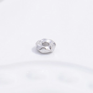 Macro shot of S925 sterling silver irregular faceted spacer bead for DIY jewelry making