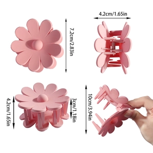 Pink flower hair claw clip shown in four perspectives with product dimensions