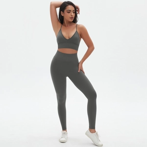 Close-up of high-elasticity dark grey seamless sports bra and high-waist yoga leggings