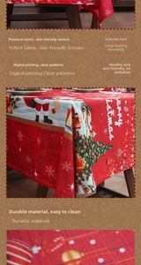 Detail of red velvet Christmas tablecloth with digital print of Santa and snowflakes
