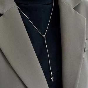 Luxury minimalist silver knot necklace in tarnish-free titanium steel for women