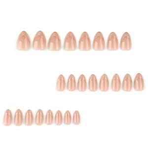 French cat-eye press-on nails with almond shape, nude pink base and gold glitter tips