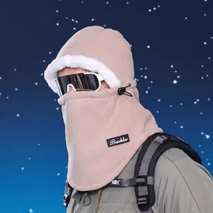 Beige winter fleece balaclava with white faux fur trim and adjustable drawstrings