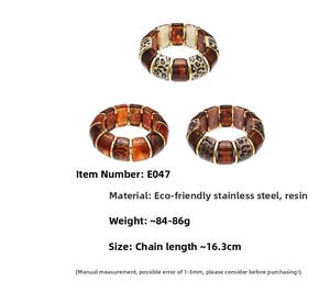 Detail view of bold resin leopard print bracelets with stainless steel and amber textures