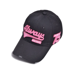 Detail of pink towel embroidery and distressed brim on a black vintage baseball cap