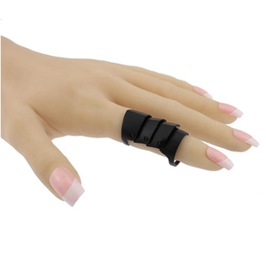 Detail of gothic punk armor ring featuring a black matte finish and four hinged sections