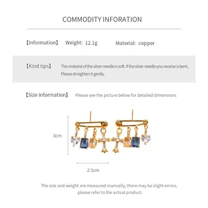 Detail view showing dimensions of copper heart earrings with cubic zirconia and silver pins