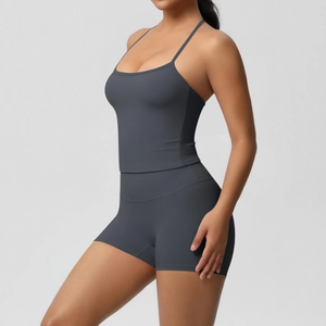 Detail of dark grey yoga set featuring high-elastic fabric and refined brushed texture