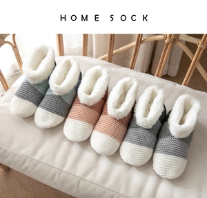Three pairs of thick thermal home socks with non-slip soles and plush fleece lining